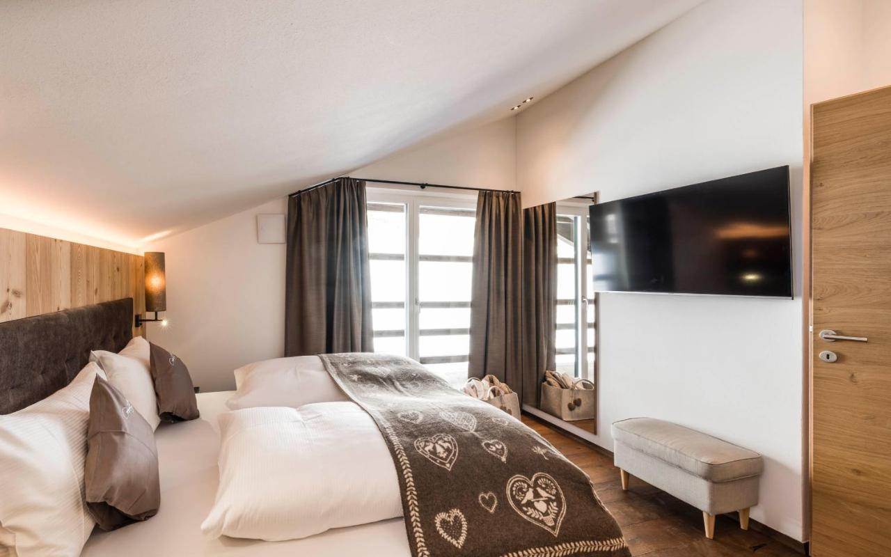 Cadepunt The Dolomites Lodge เซลวาดีวัลการ์เดนา ภายนอก รูปภาพ