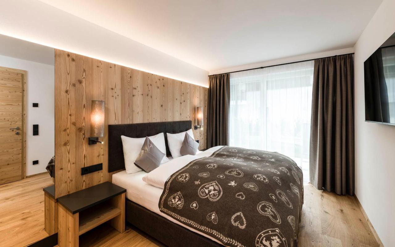 Cadepunt The Dolomites Lodge เซลวาดีวัลการ์เดนา ภายนอก รูปภาพ